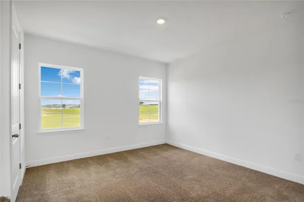 a bathroom with a sink and a large mirror