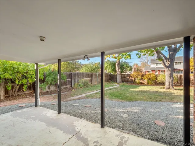 a view of a porch and garden