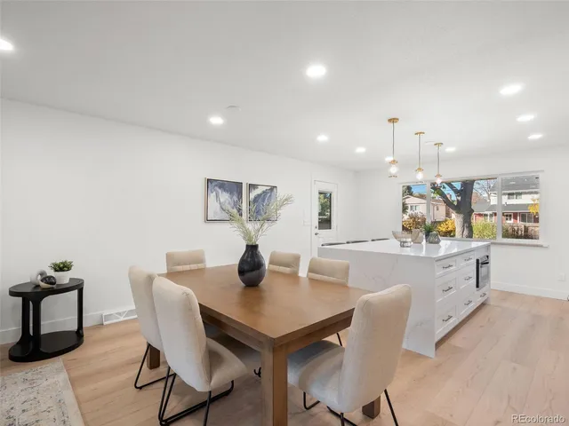 a view of a dining room with furniture