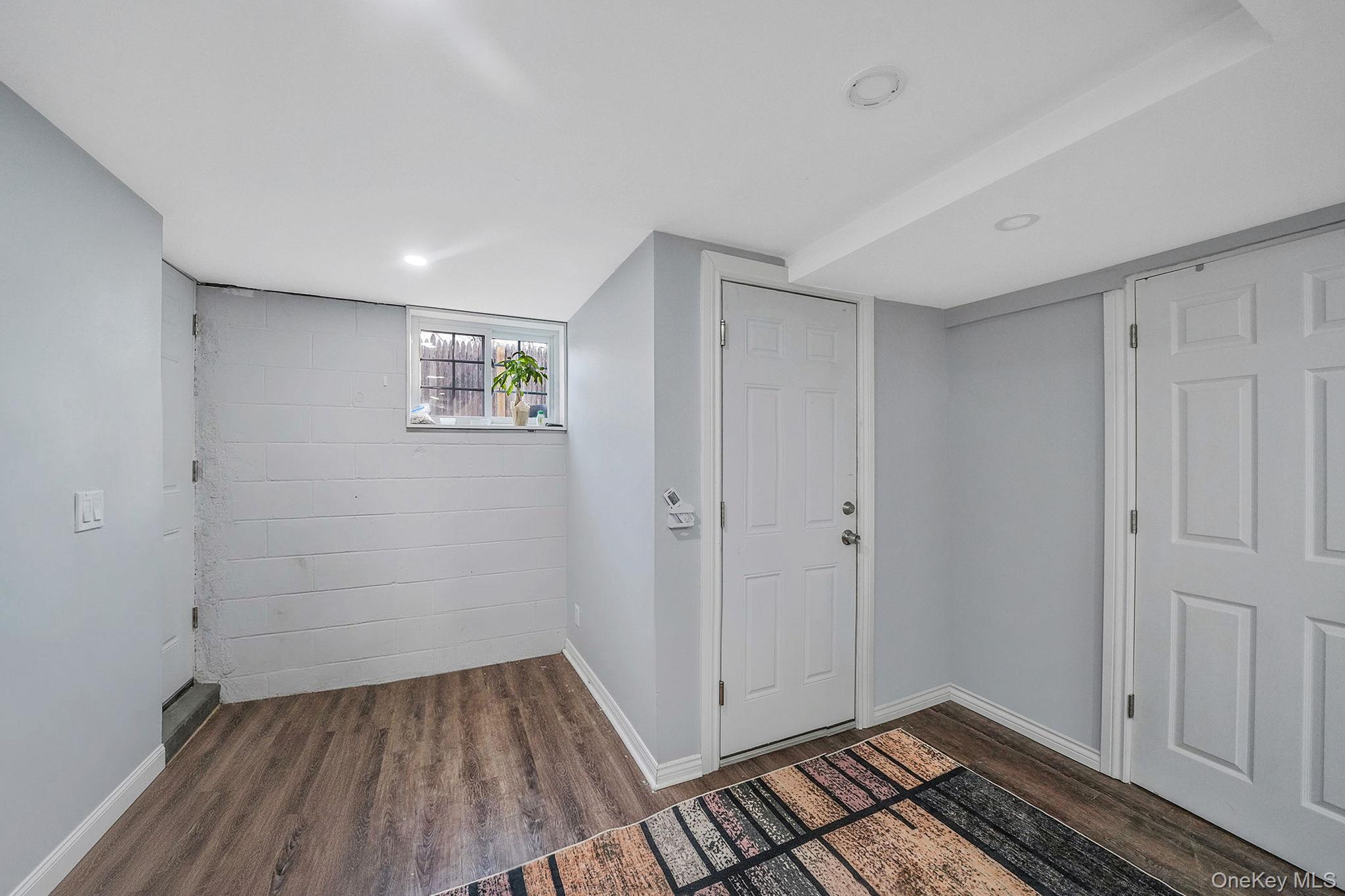 139 Madison Street Mastic, NY 11950 - Photo 24 of 38 finished basement