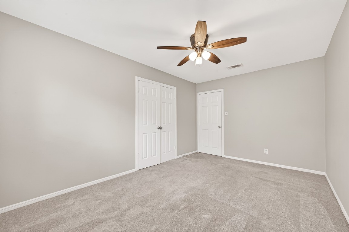 4230 Annawood Circle Spring, TX 77388 - Photo 12 of 50 a view of a big room with a ceiling fan and carpet