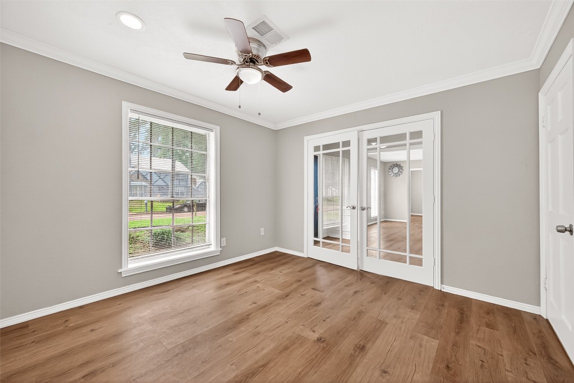 4230 Annawood Circle Spring, TX 77388 - Photo 17 of 50 a view of an empty room with a window and wooden floor