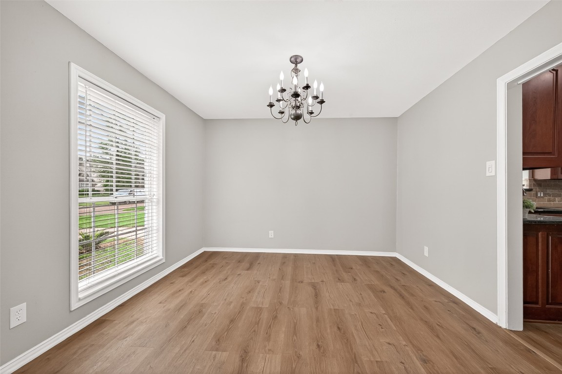 4230 Annawood Circle Spring, TX 77388 - Photo 22 of 50 wooden floor in an empty room with a window