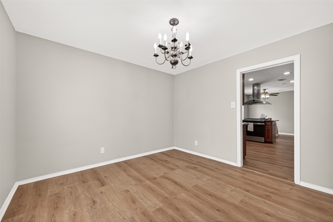 4230 Annawood Circle Spring, TX 77388 - Photo 23 of 50 wooden floor in an empty room with a window