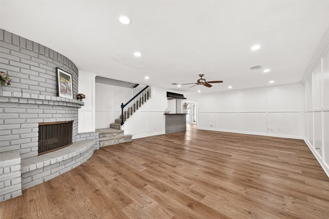 4230 Annawood Circle Spring, TX 77388 - Photo 26 of 50 a view of empty room with wooden floor and fireplace