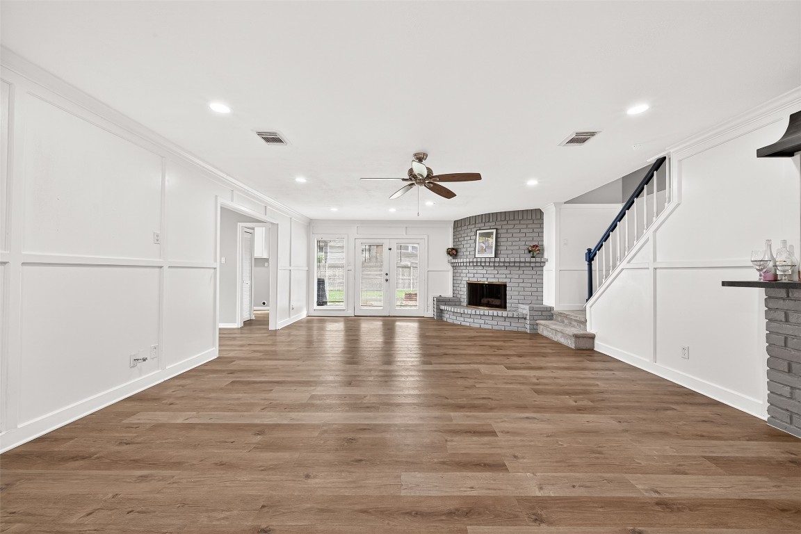 4230 Annawood Circle Spring, TX 77388 - Photo 27 of 50 a view of empty room with wooden floor and fireplace
