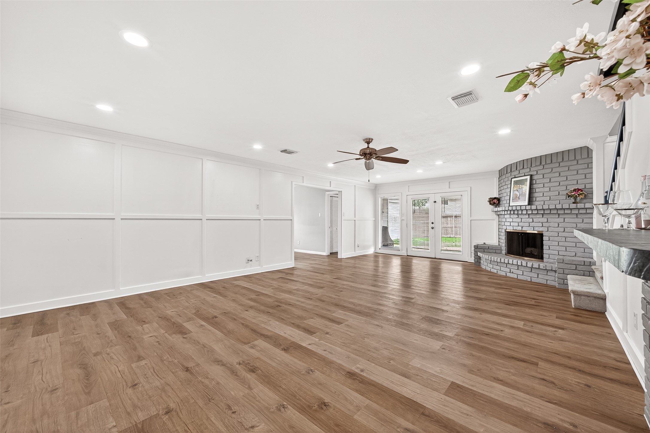 4230 Annawood Circle Spring, TX 77388 - Photo 28 of 50 a view of empty room with wooden floor and fireplace