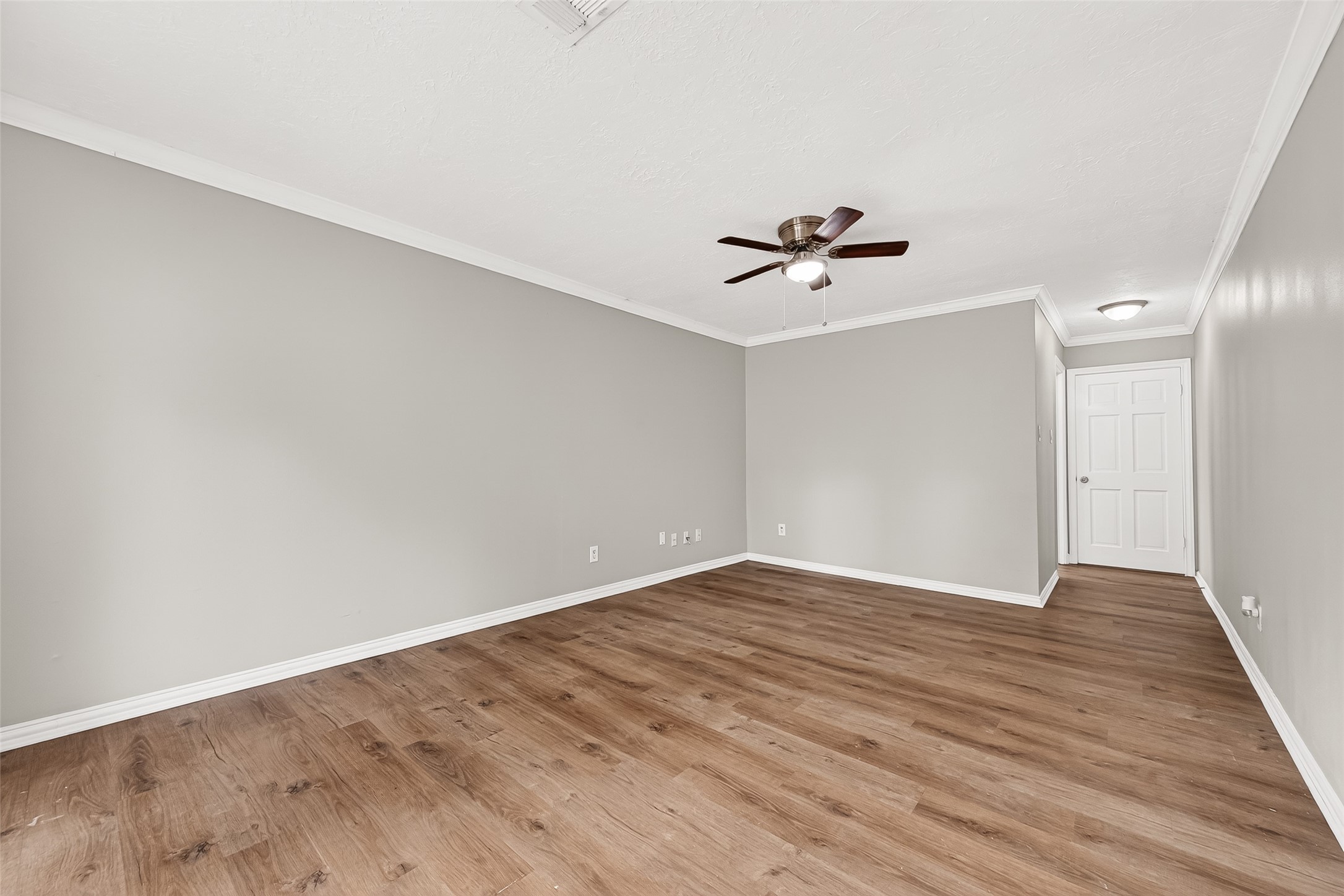 4230 Annawood Circle Spring, TX 77388 - Photo 42 of 50 a view of a room with wooden floor and a ceiling fan