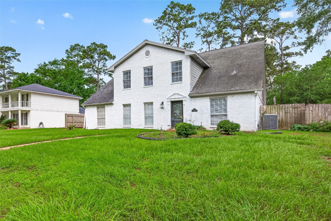 4230 Annawood Circle Spring, TX 77388 - Photo 48 of 50 a view of a yard in front of a house with plants and large tree