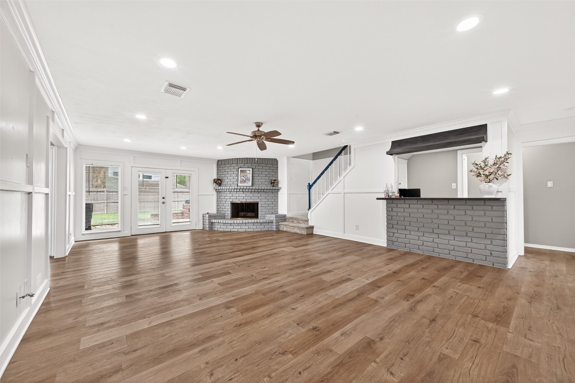 4230 Annawood Circle Spring, TX 77388 - Photo 6 of 50 a view of empty room with wooden floor and fireplace