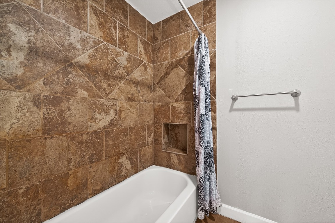 4230 Annawood Circle Spring, TX 77388 - Photo 8 of 50 a bathroom with a bathtub and shower