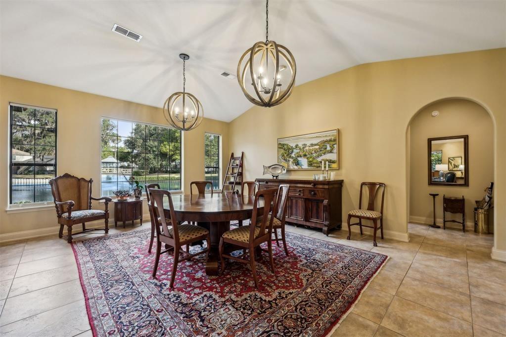 96022 Heath Point Lane Fernandina Beach, FL 32034 - Photo 12 of 39 a view of a dining room with furniture window and wooden floor