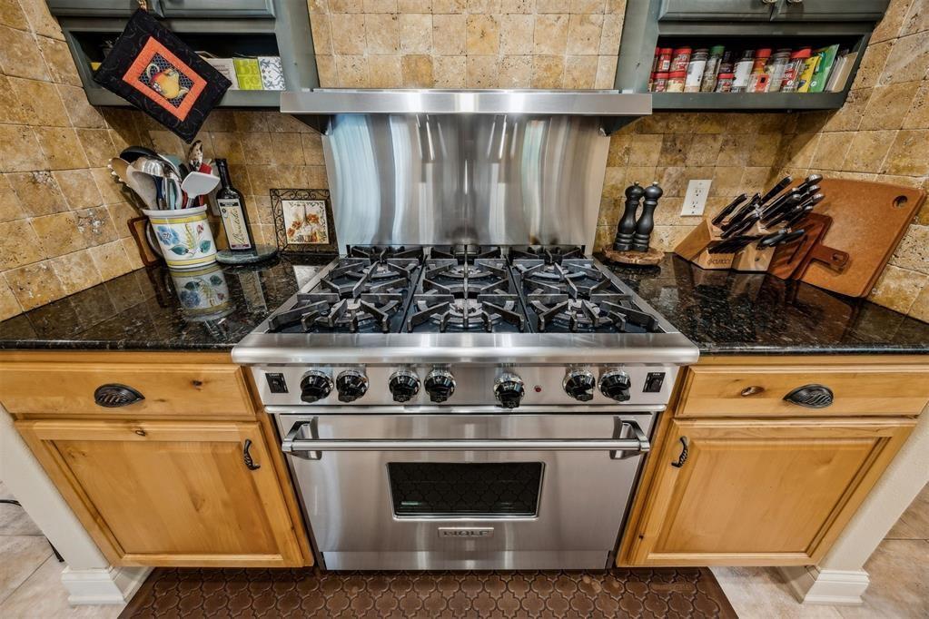 96022 Heath Point Lane Fernandina Beach, FL 32034 - Photo 18 of 39 a stove top oven sitting inside of a kitchen