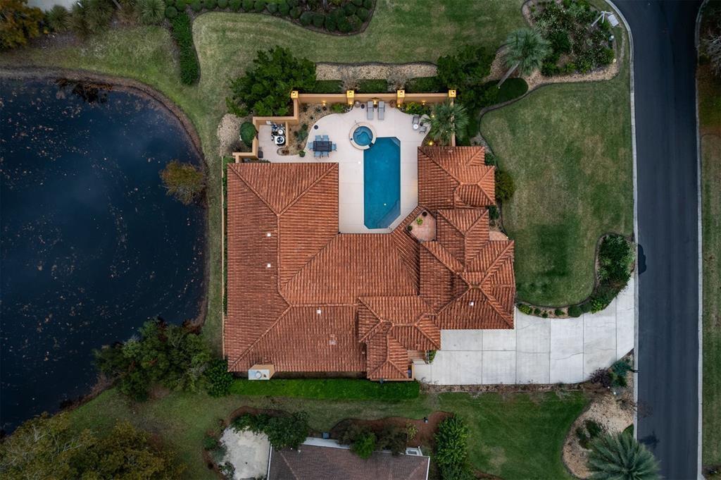96022 Heath Point Lane Fernandina Beach, FL 32034 - Photo 2 of 39 an aerial view of a house with a garden