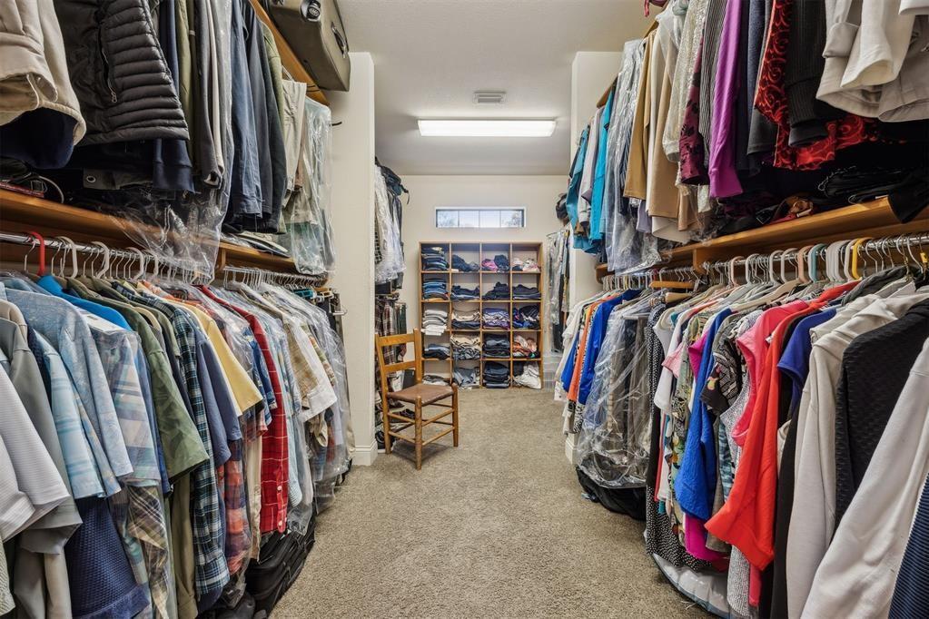 96022 Heath Point Lane Fernandina Beach, FL 32034 - Photo 24 of 39 a view of walk in closet with clothes and shoes