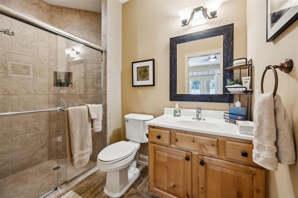 96022 Heath Point Lane Fernandina Beach, FL 32034 - Photo 26 of 39 a bathroom with a sink toilet and shower