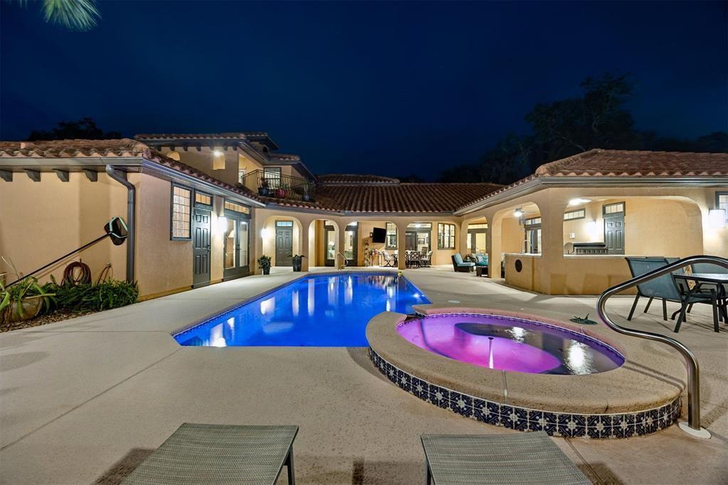 96022 Heath Point Lane Fernandina Beach, FL 32034 - Photo 3 of 39 a view of a swimming pool with seating space