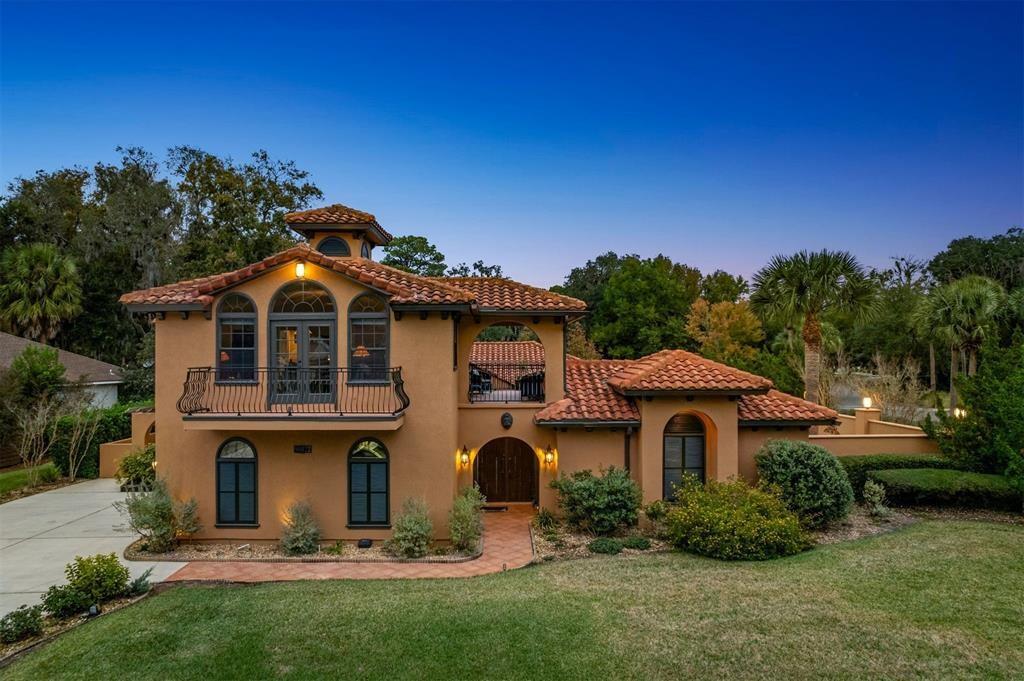 96022 Heath Point Lane Fernandina Beach, FL 32034 - Photo 32 of 39 a front view of a house with a yard