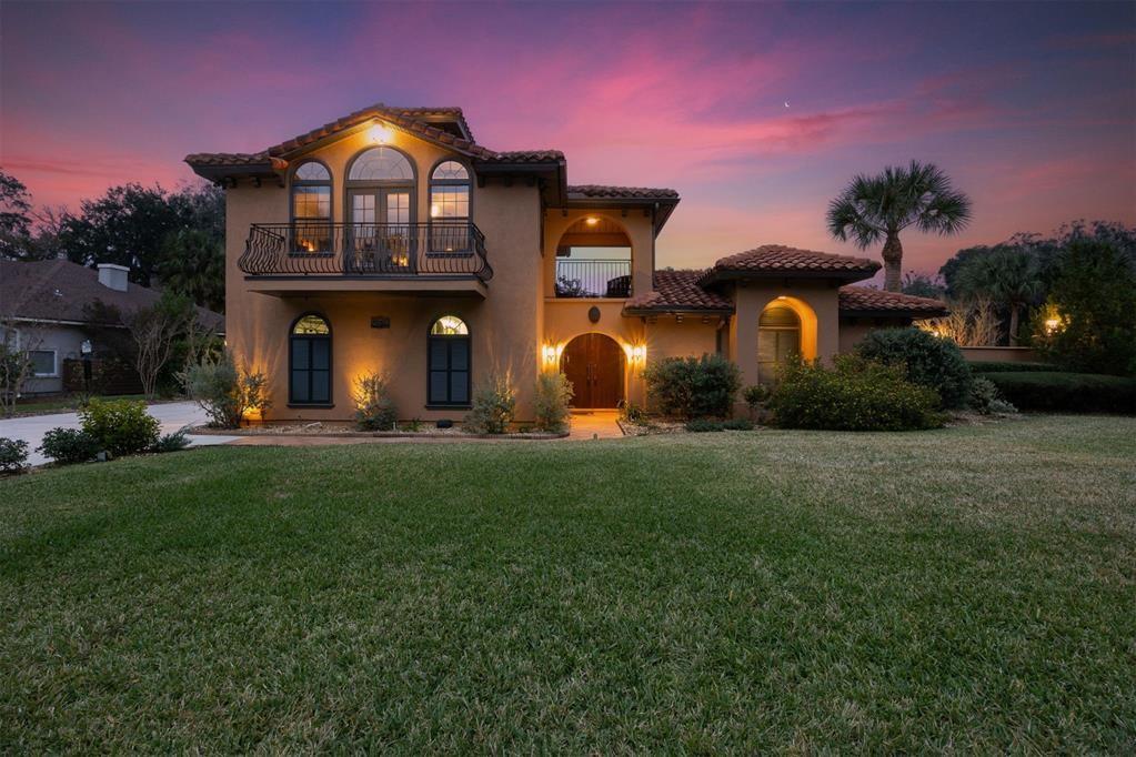 96022 Heath Point Lane Fernandina Beach, FL 32034 - Photo 34 of 39 a view of a big yard in front of the house