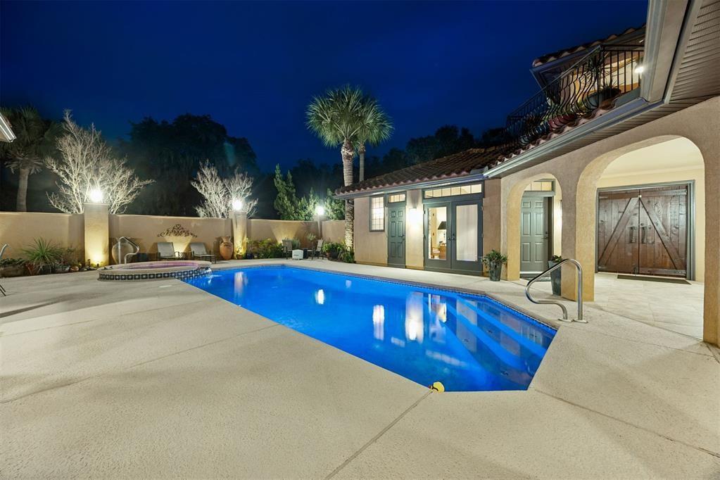 96022 Heath Point Lane Fernandina Beach, FL 32034 - Photo 7 of 39 a living room with furniture and a swimming pool