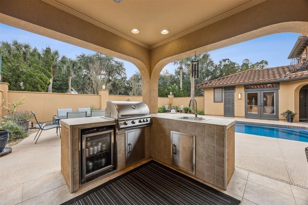 96022 Heath Point Lane Fernandina Beach, FL 32034 - Photo 8 of 39 a open kitchen with a stove and a large window