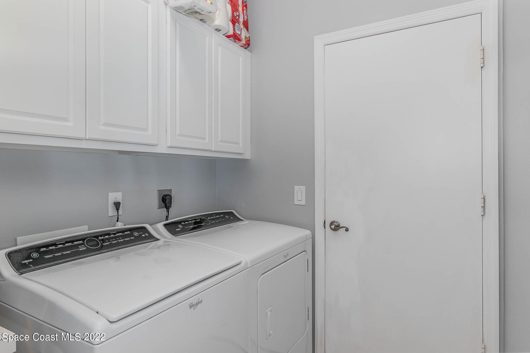 1836 Windbrook Drive Palm Bay, FL 32909 - Photo 33 of 41 a utility room with dryer and washer