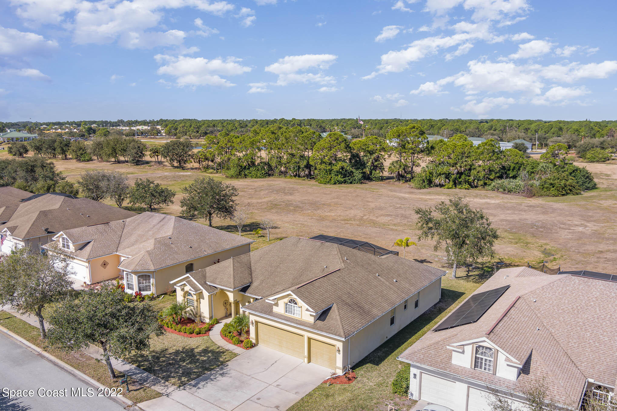 1836 Windbrook Drive Palm Bay, FL 32909 - Photo 4 of 41 an aerial view of a house with a yard