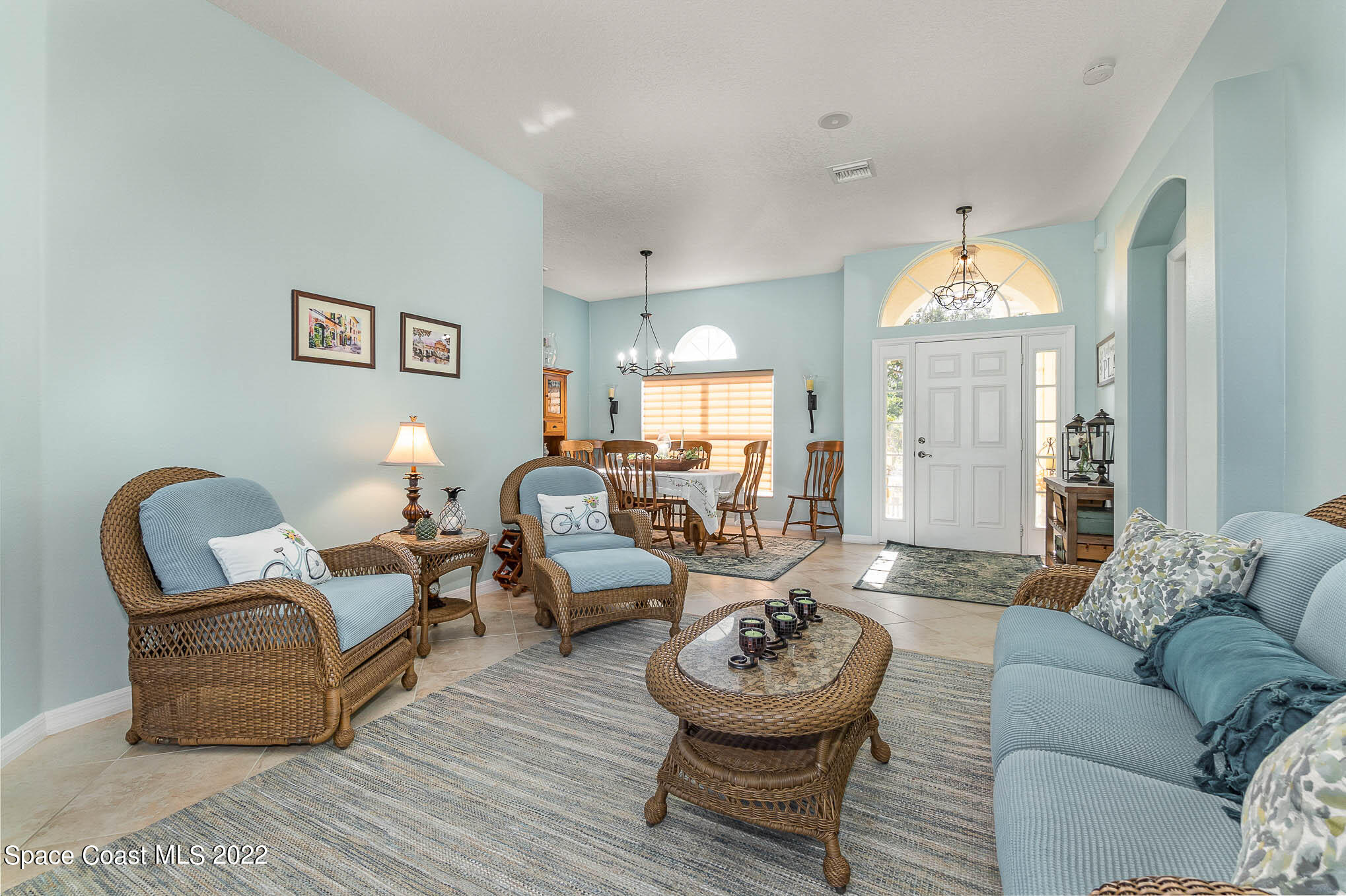 1836 Windbrook Drive Palm Bay, FL 32909 - Photo 6 of 41 a living room with furniture and a large window