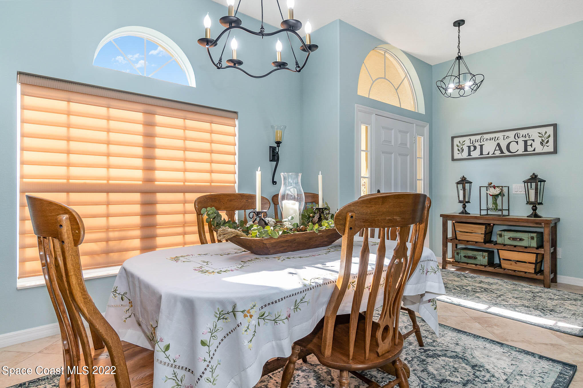 1836 Windbrook Drive Palm Bay, FL 32909 - Photo 9 of 41 a view of a dining room with furniture window and wooden floor