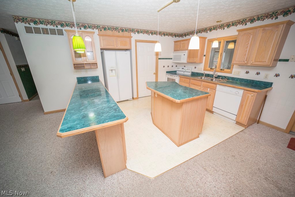 48120 Cooper Foster Park Road Amherst, OH 44001 - Photo 4 of 29 Good sized kitchen with solid cabinets and eat in bar!