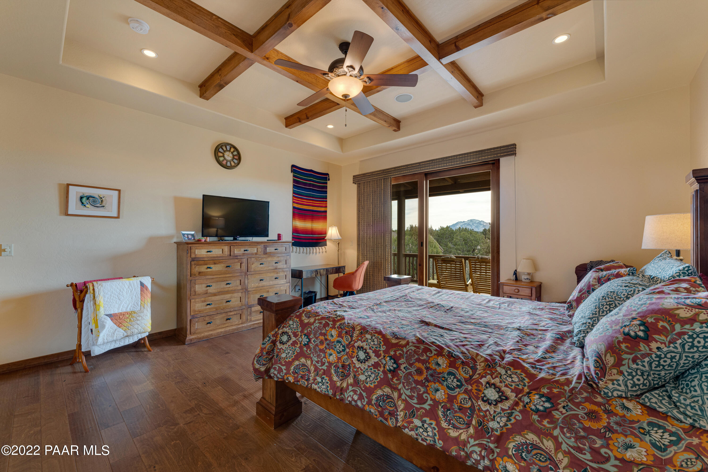 5695 West Three Forks Road Prescott, AZ 86305 - Photo 20 of 48 a bedroom with a bed window and a flat screen tv