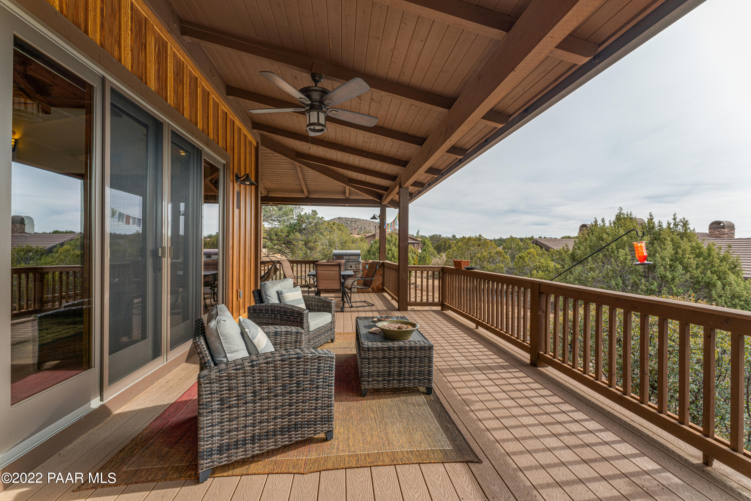 5695 West Three Forks Road Prescott, AZ 86305 - Photo 27 of 48 a view of balcony with couch and wooden floor