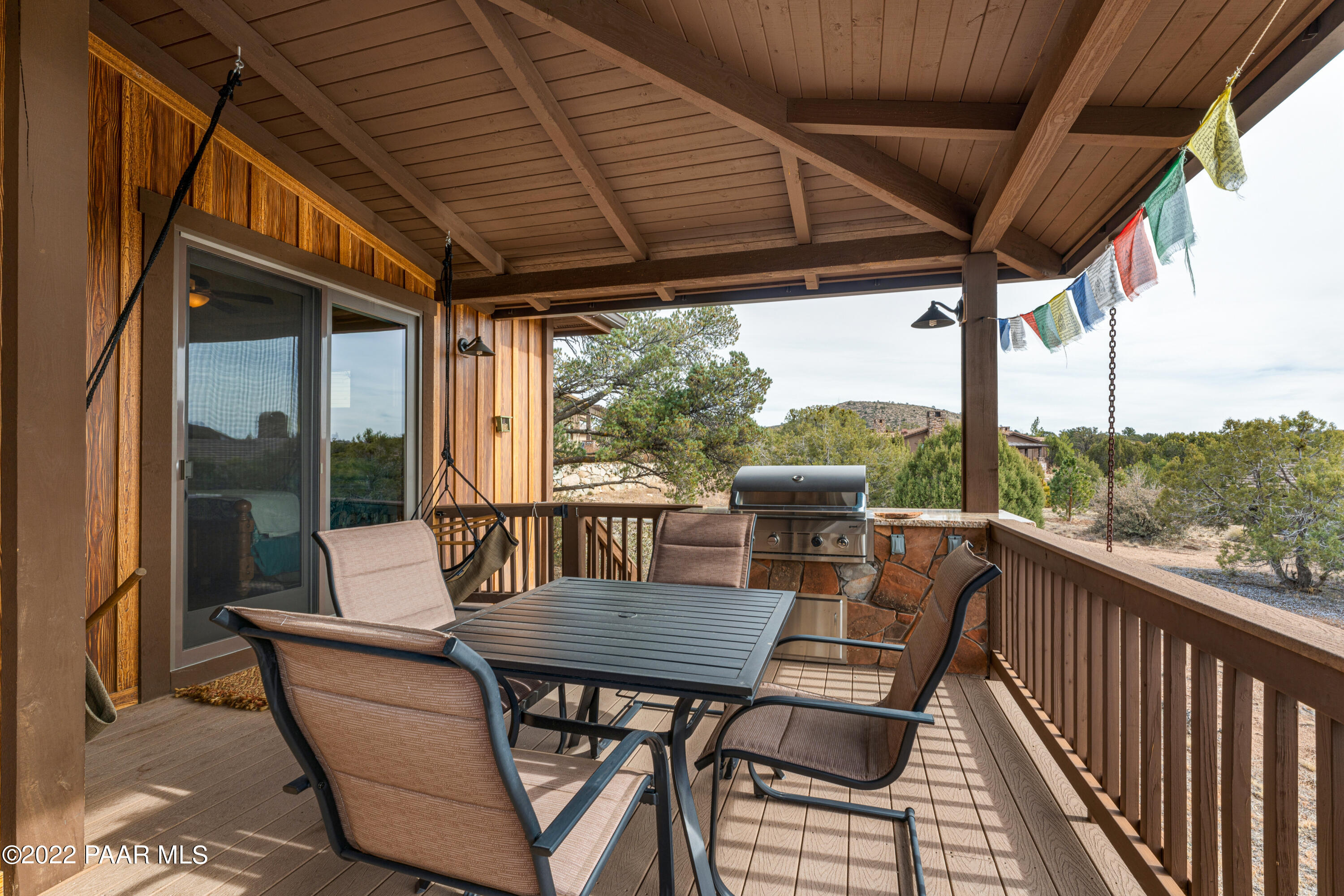 5695 West Three Forks Road Prescott, AZ 86305 - Photo 28 of 48 a view of porch with a table and chairs
