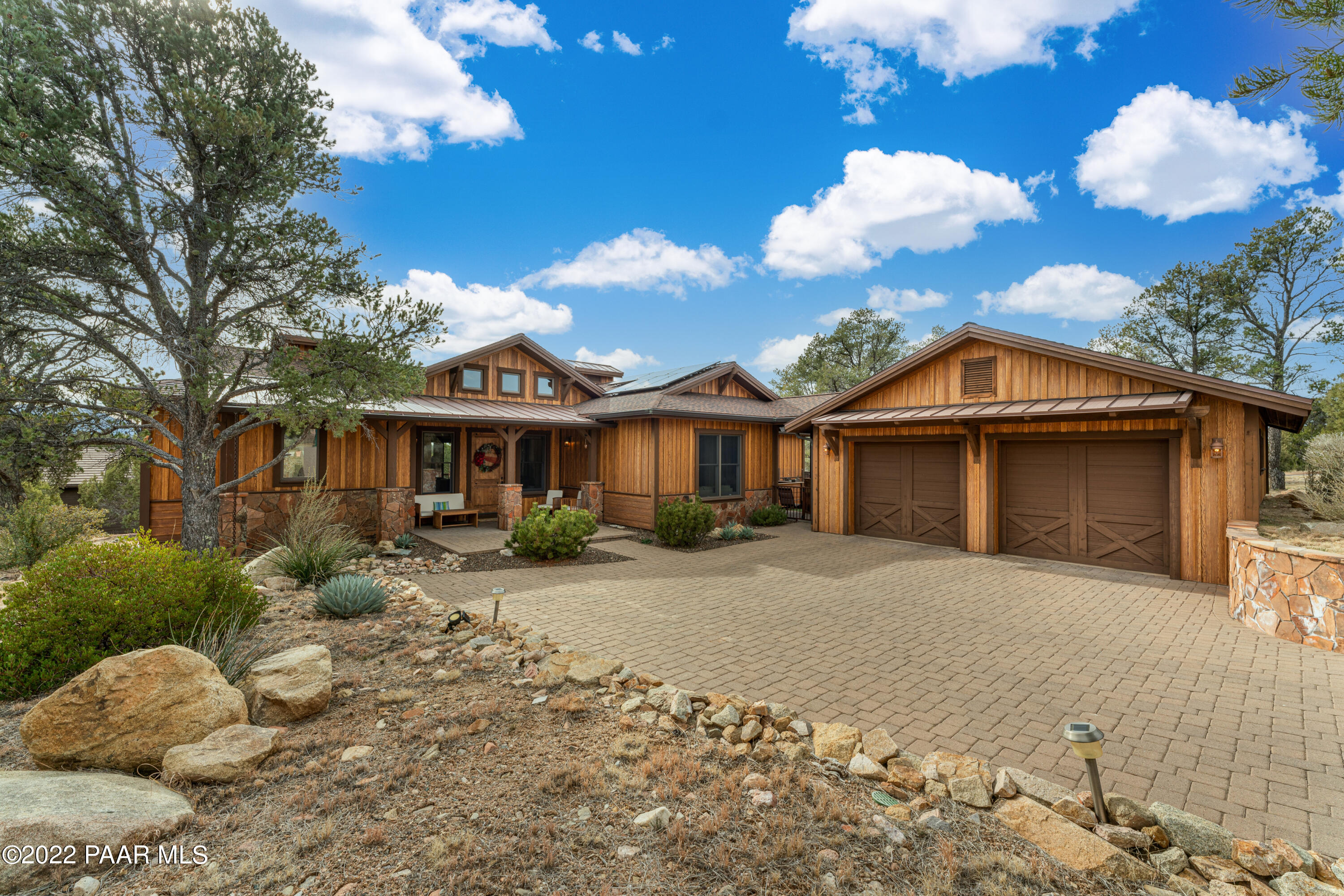 5695 West Three Forks Road Prescott, AZ 86305 - Photo 3 of 48 a front view of a house with a yard
