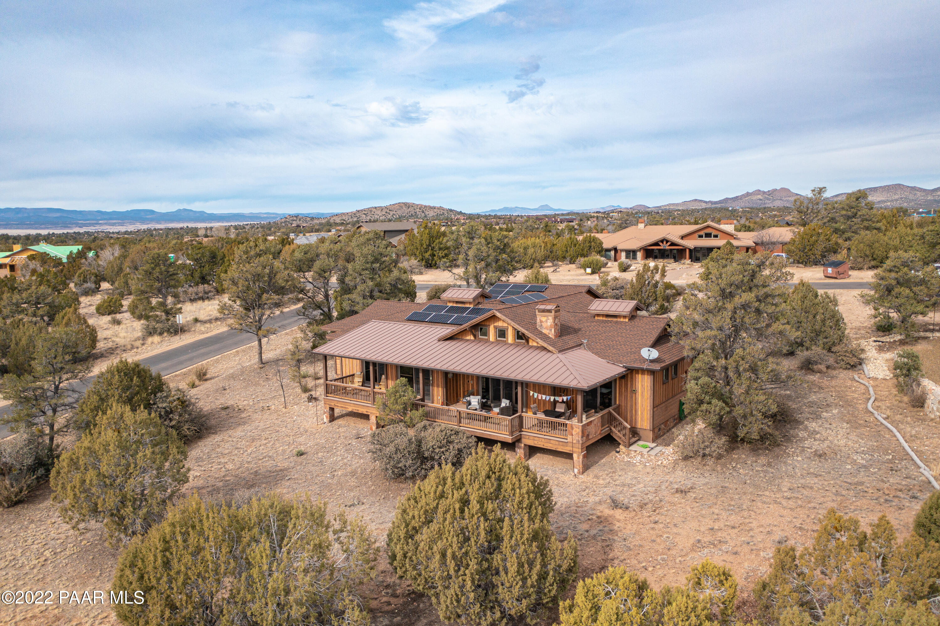 5695 West Three Forks Road Prescott, AZ 86305 - Photo 35 of 48 a view of a lake with a mountain in the background