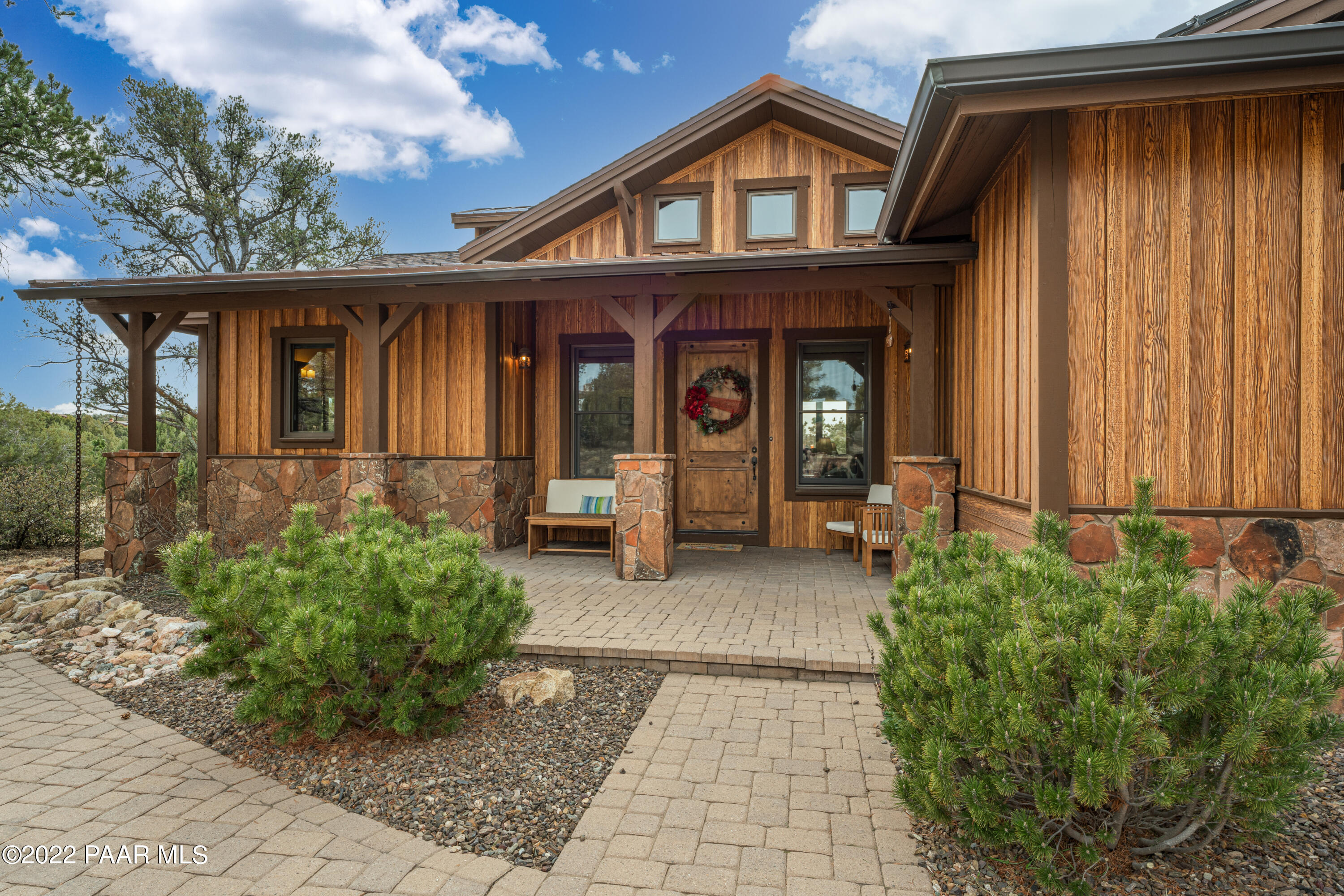 5695 West Three Forks Road Prescott, AZ 86305 - Photo 4 of 48 a front view of a house with garden