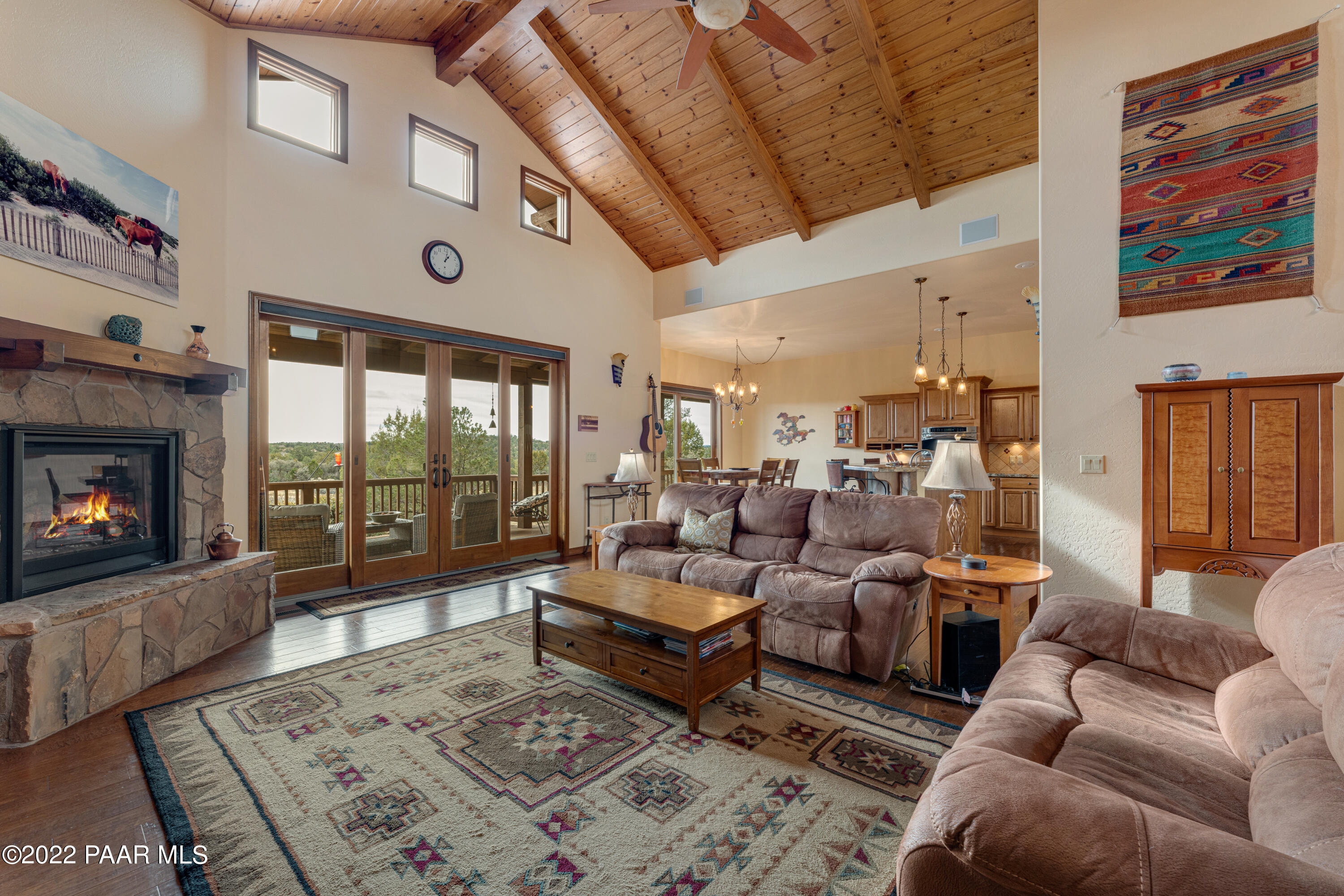 5695 West Three Forks Road Prescott, AZ 86305 - Photo 7 of 48 a living room with furniture large window and a fireplace