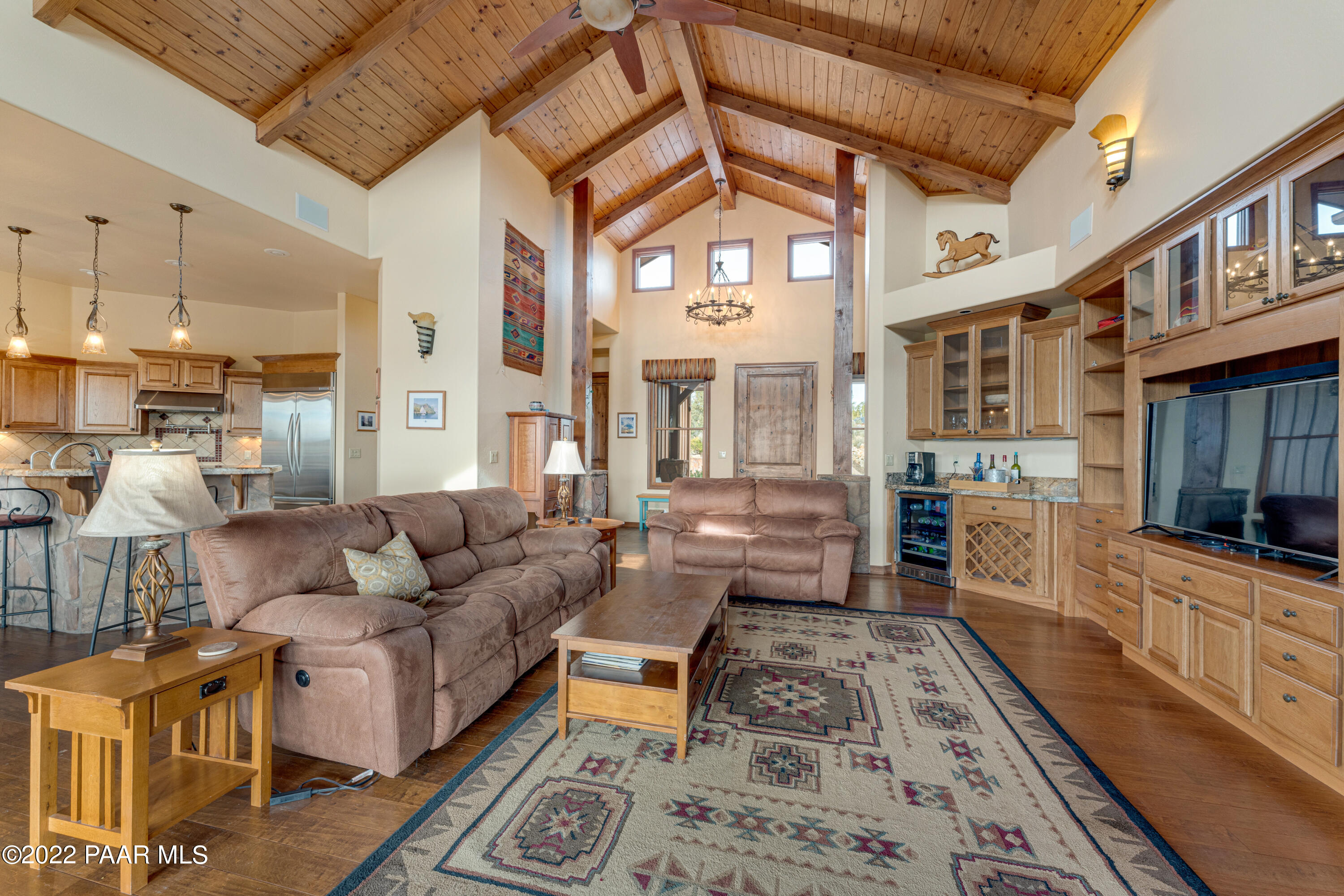 5695 West Three Forks Road Prescott, AZ 86305 - Photo 10 of 48 a living room with furniture and a flat screen tv