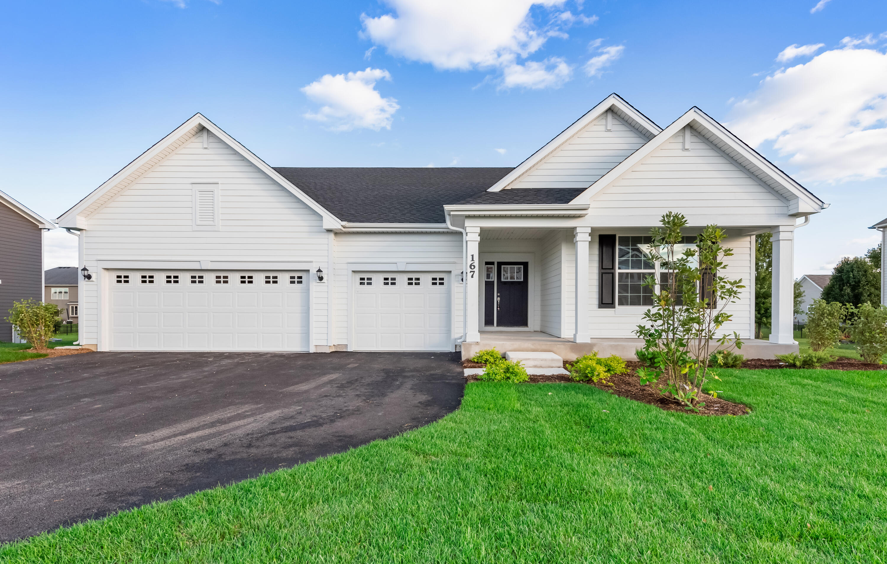 6054 East 112th Place Winfield, IN 46307 - Photo 1 of 29 a view of a house with garden and yard