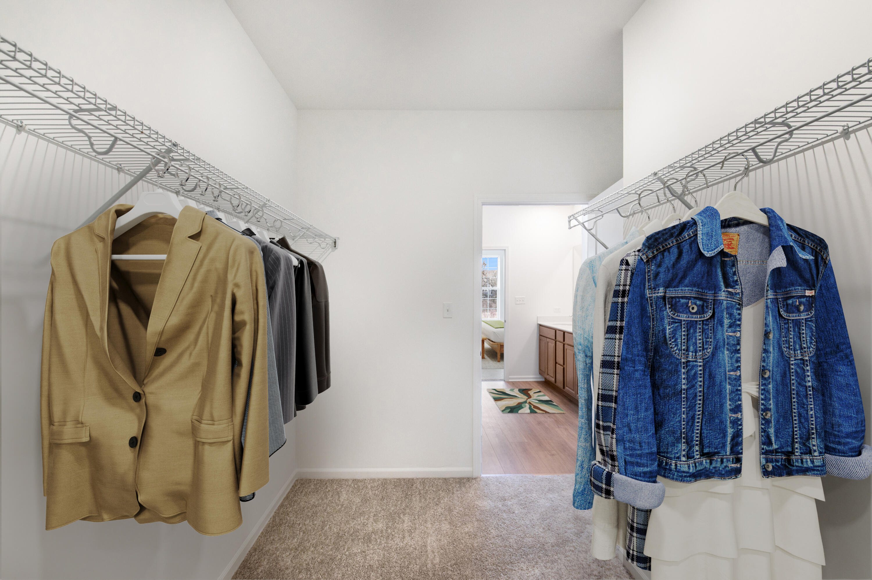 6054 East 112th Place Winfield, IN 46307 - Photo 22 of 29 a view of walk in closet with clothes and shoes