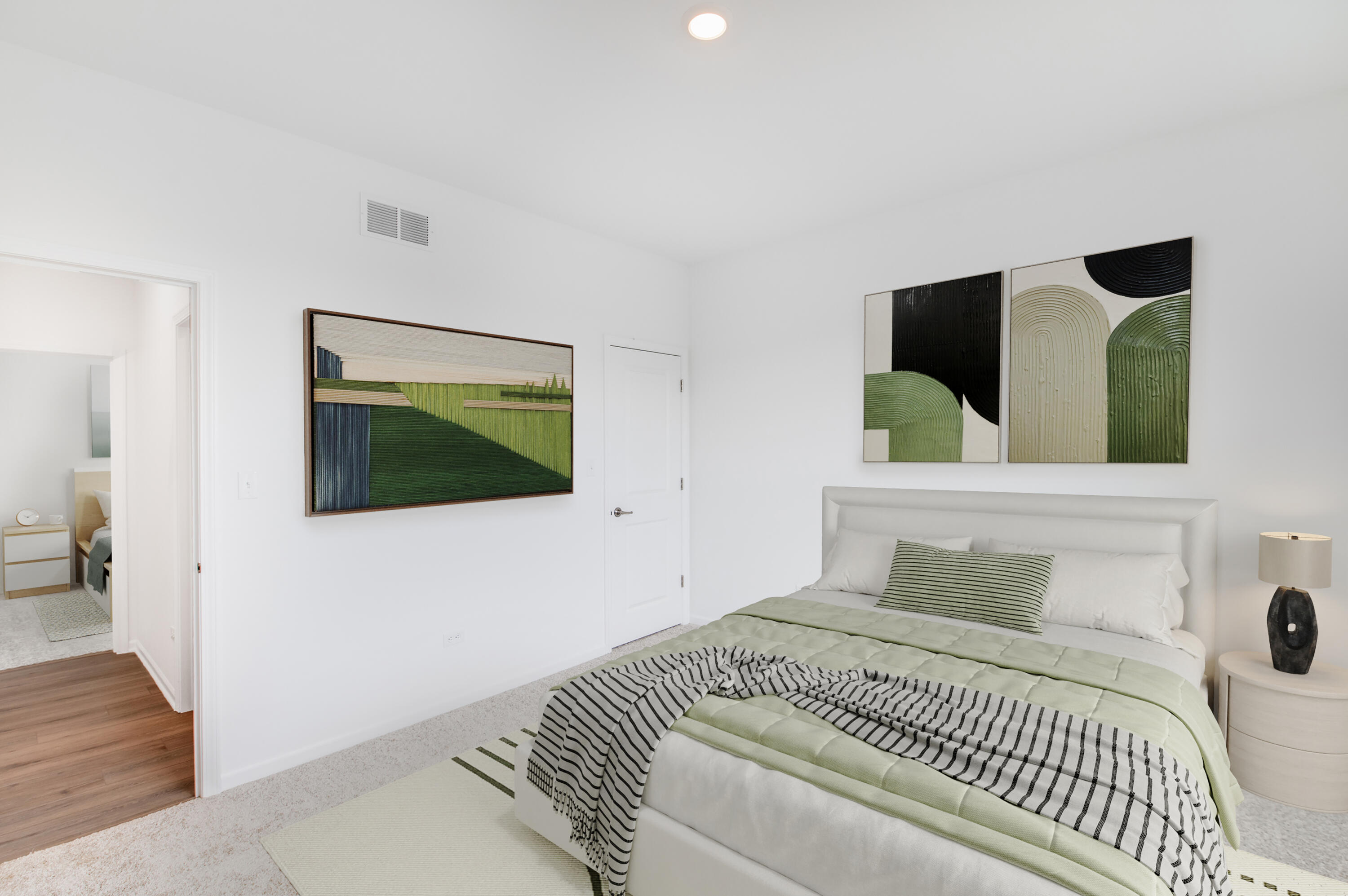 6054 East 112th Place Winfield, IN 46307 - Photo 26 of 29 a bedroom with a large bed and a flat screen tv