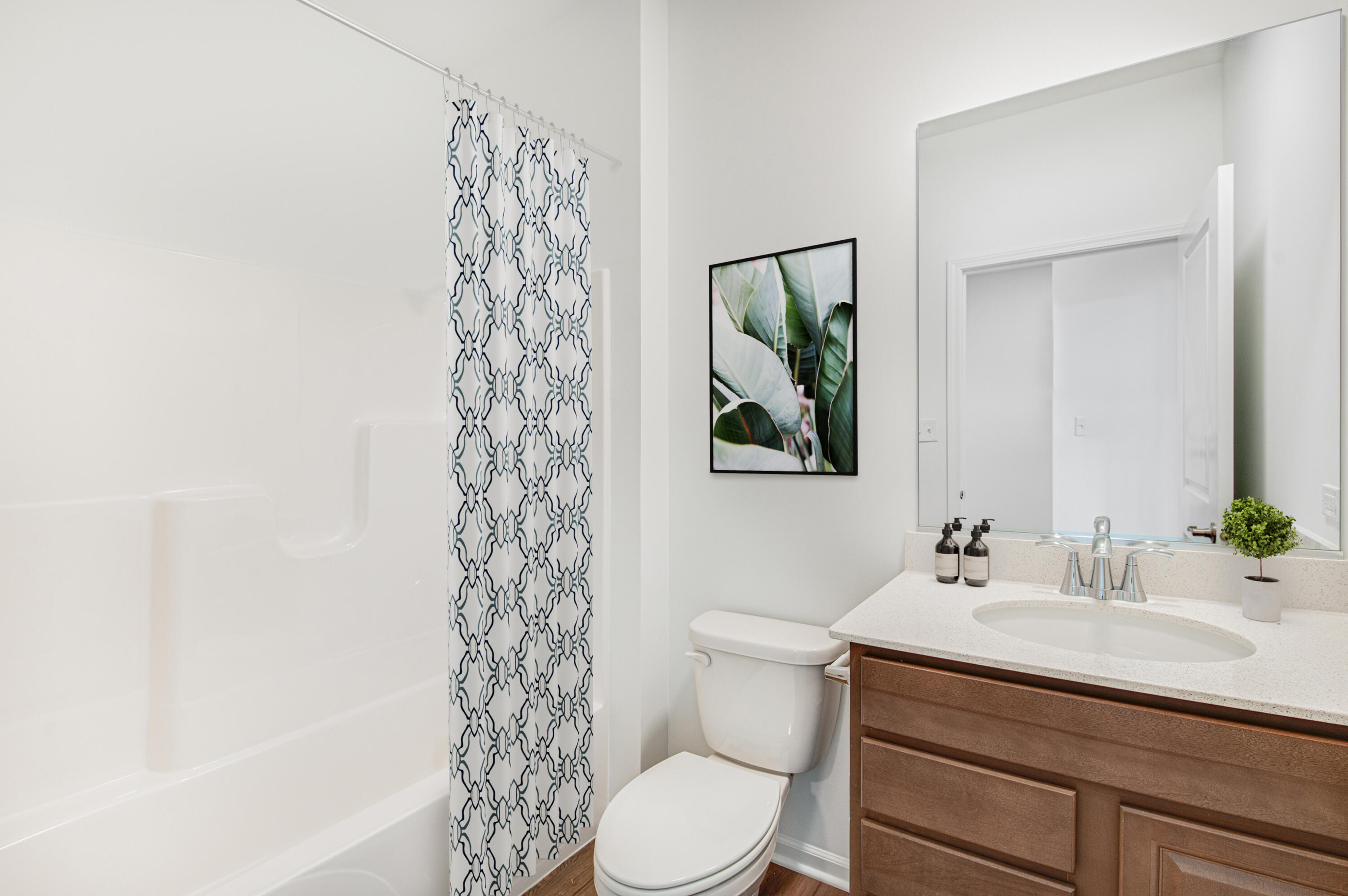 6054 East 112th Place Winfield, IN 46307 - Photo 27 of 29 a bathroom with a sink a toilet and shower