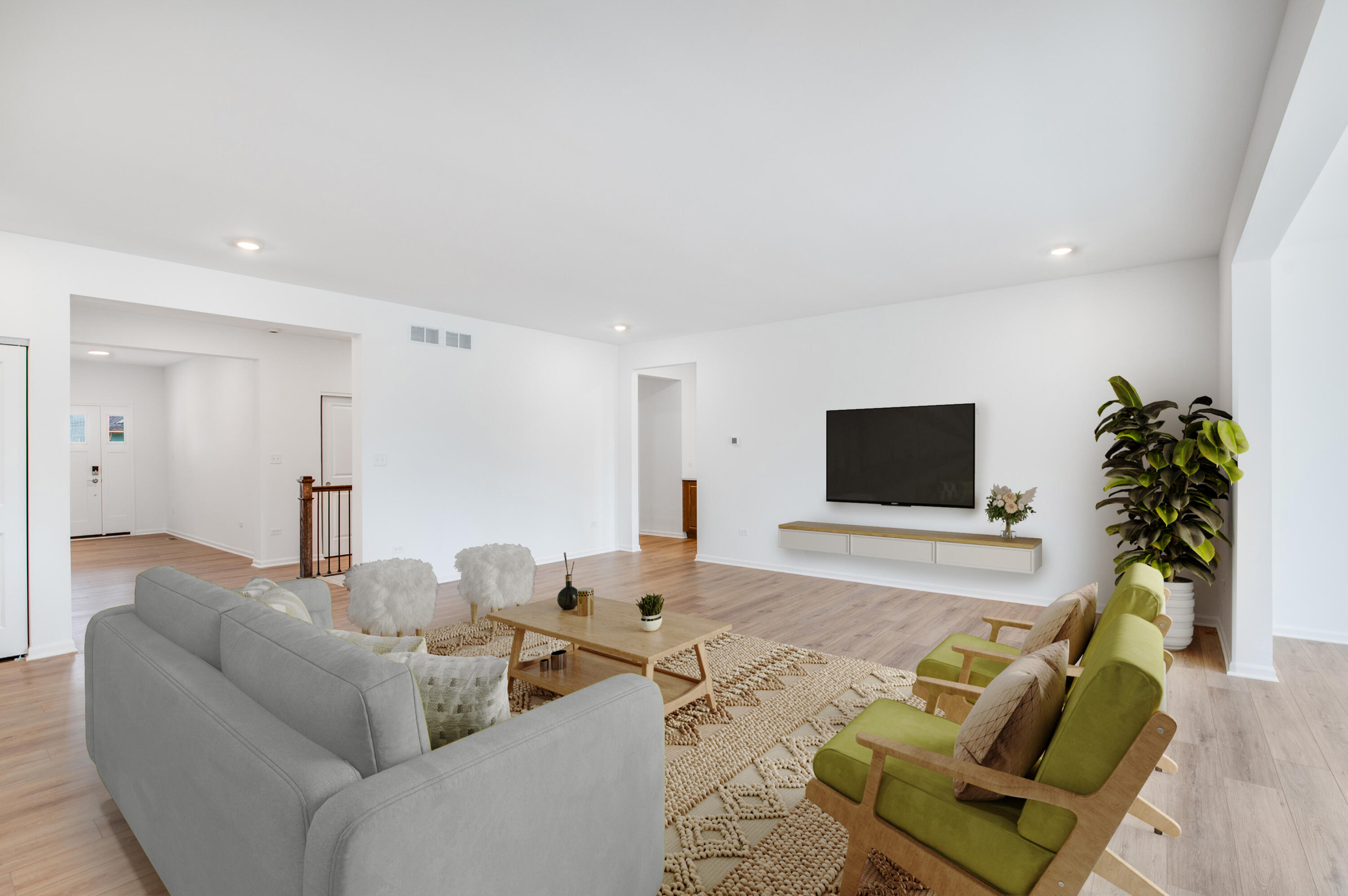 6054 East 112th Place Winfield, IN 46307 - Photo 9 of 29 a living room with furniture and a flat screen tv