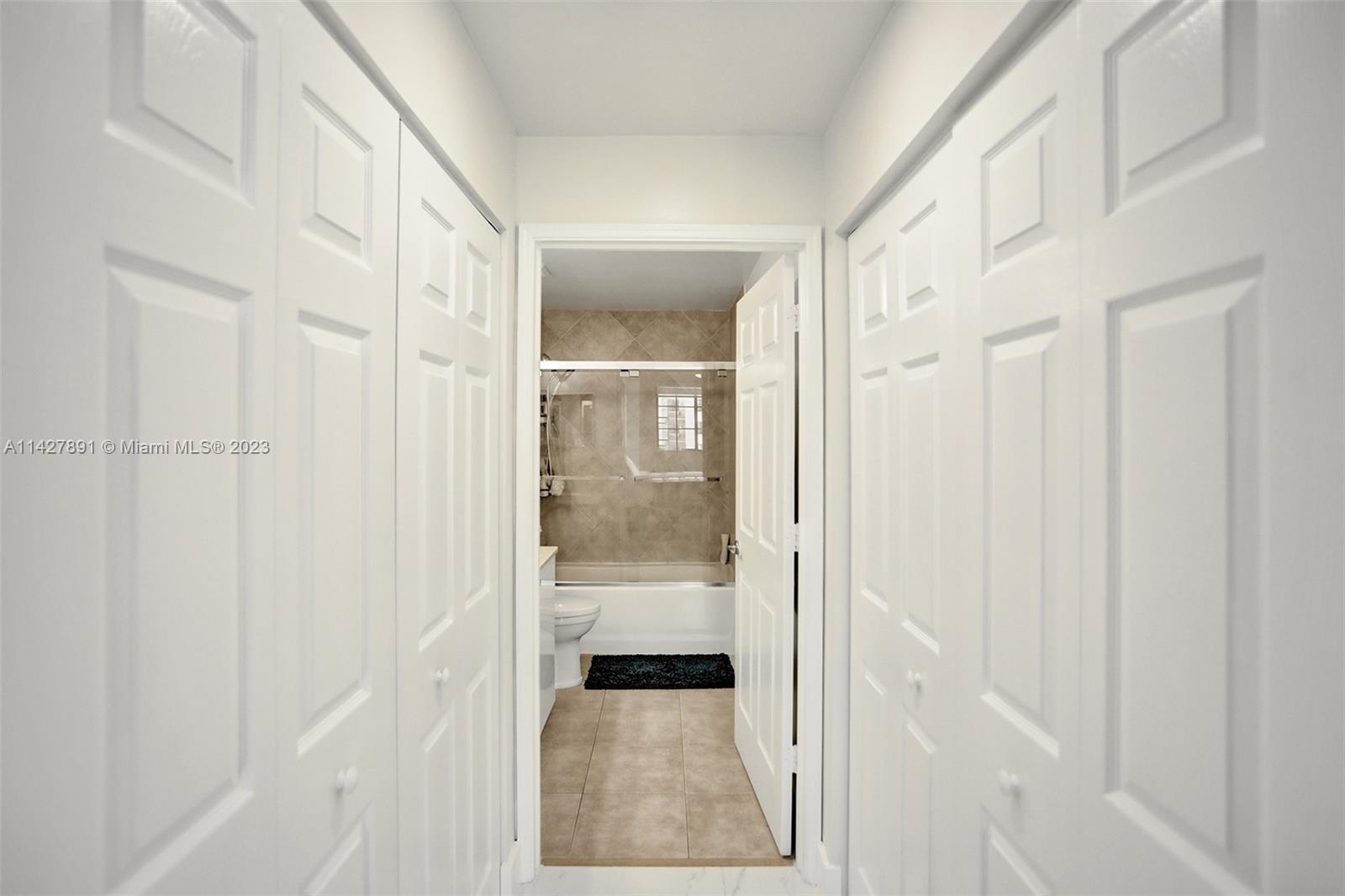 233 South Federal Highway, Unit 605 Boca Raton, FL 33432 - Photo 20 of 41 a view of a bathroom from a hallway