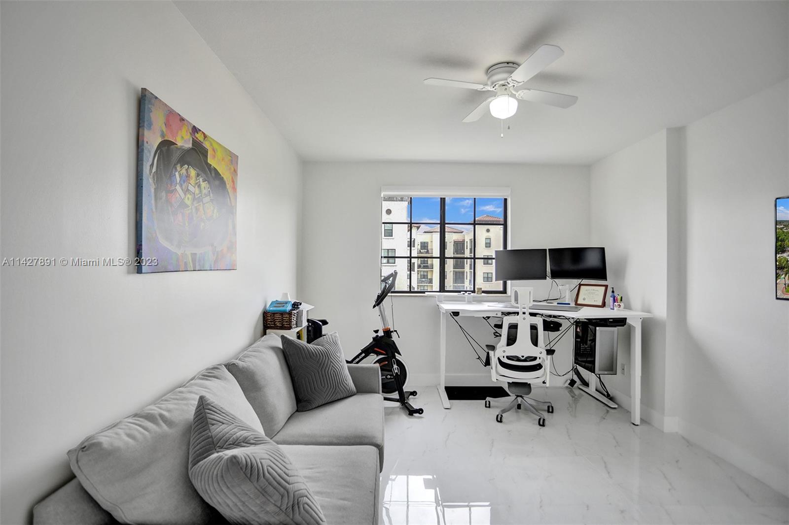 233 South Federal Highway, Unit 605 Boca Raton, FL 33432 - Photo 22 of 41 a work room with furniture and a ceiling fan