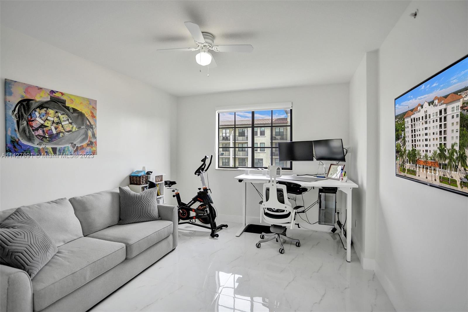 233 South Federal Highway, Unit 605 Boca Raton, FL 33432 - Photo 24 of 41 a view of a livingroom with workspace and a couch