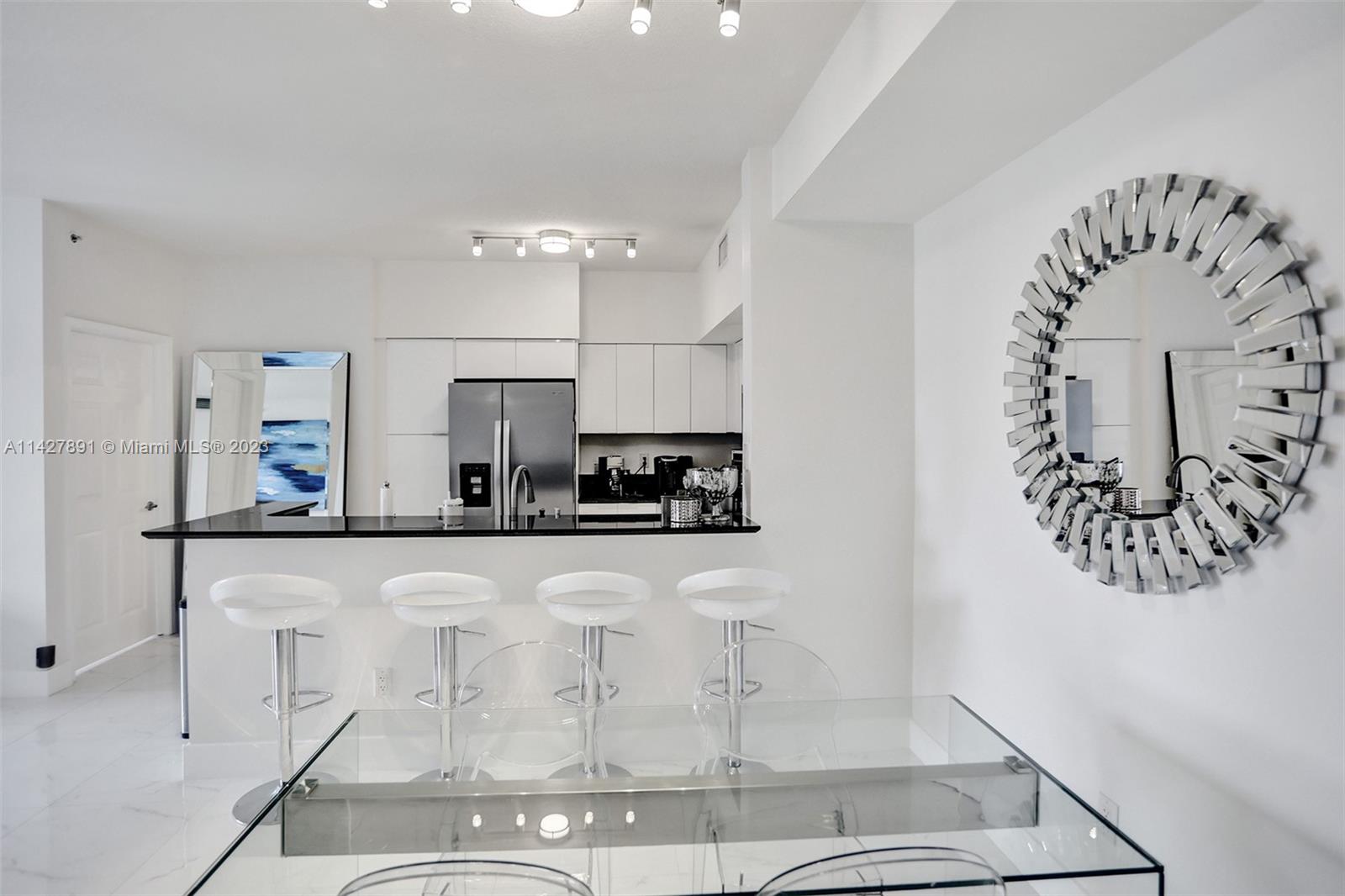 233 South Federal Highway, Unit 605 Boca Raton, FL 33432 - Photo 5 of 41 a kitchen with a sink and cabinets
