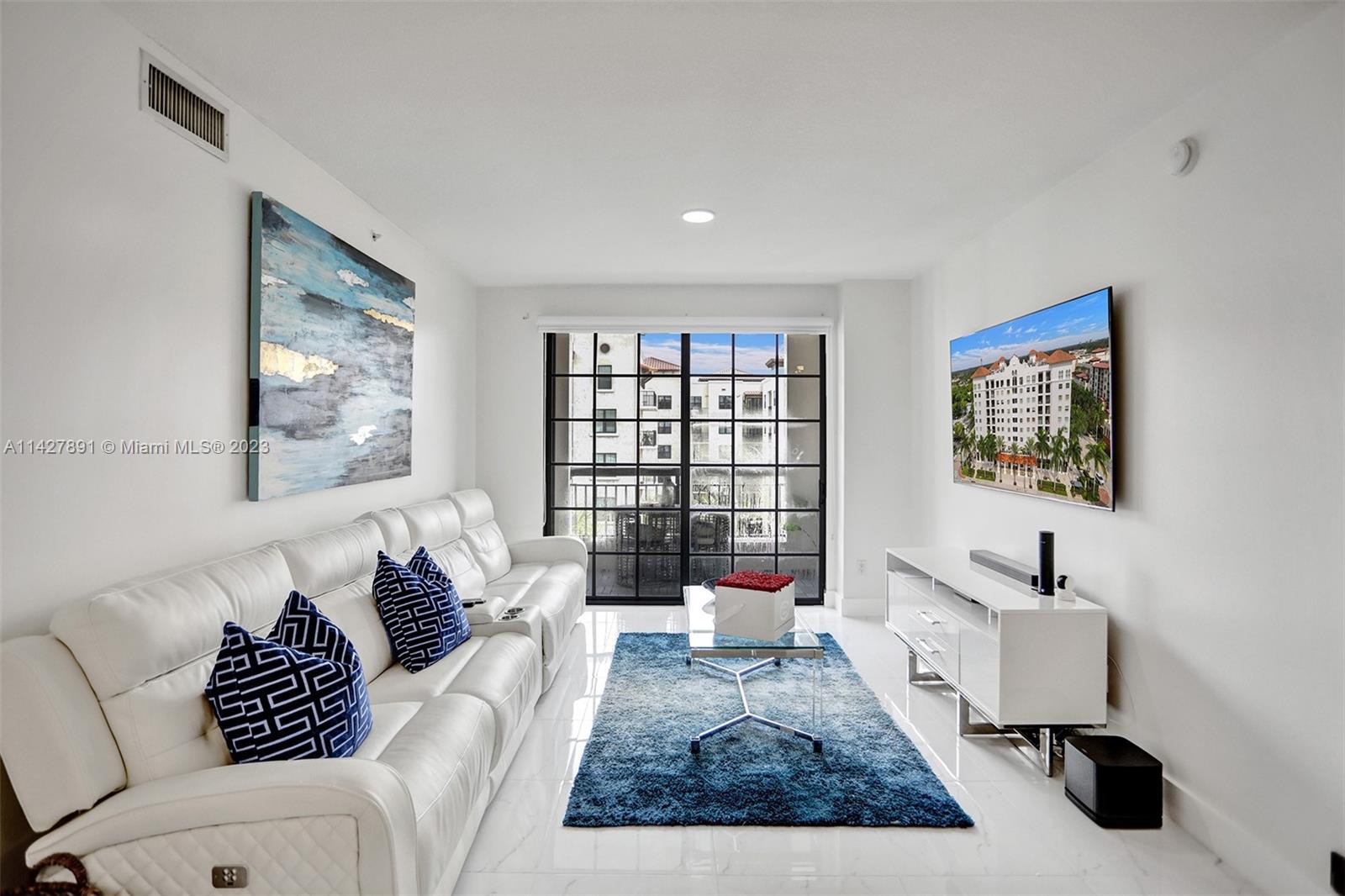 233 South Federal Highway, Unit 605 Boca Raton, FL 33432 - Photo 7 of 41 a living room with furniture and a window