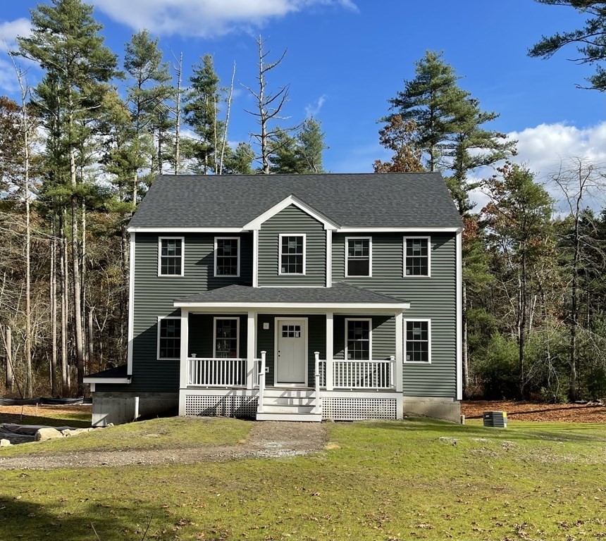 10 Squirrel Island Road West Wareham, MA 02576 - Photo 1 of 12 a front view of a house with a yard