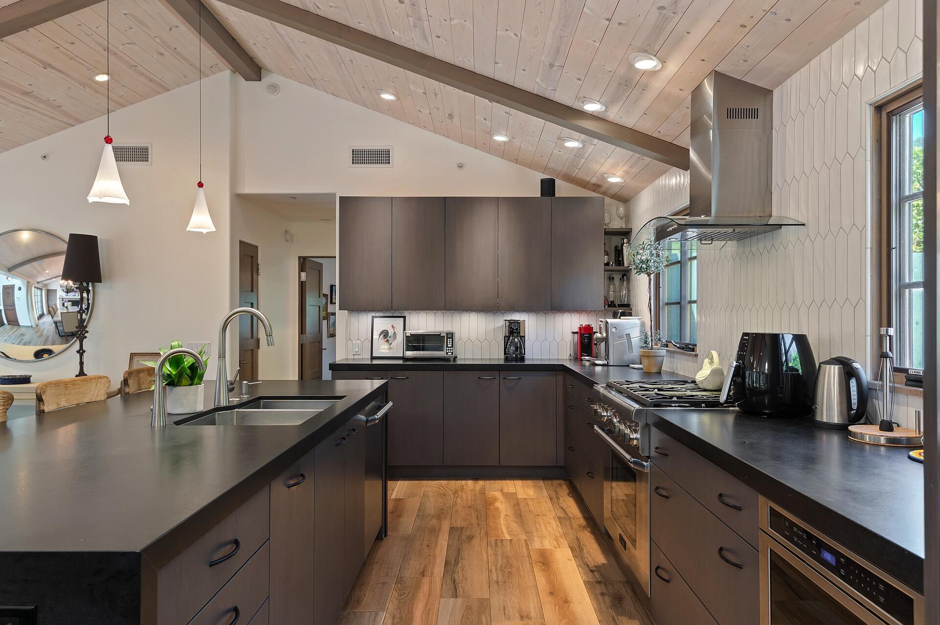 Undisclosed Address Montecito, CA 93108 - Photo 11 of 33 a large kitchen with lots of counter space and stainless steel appliances